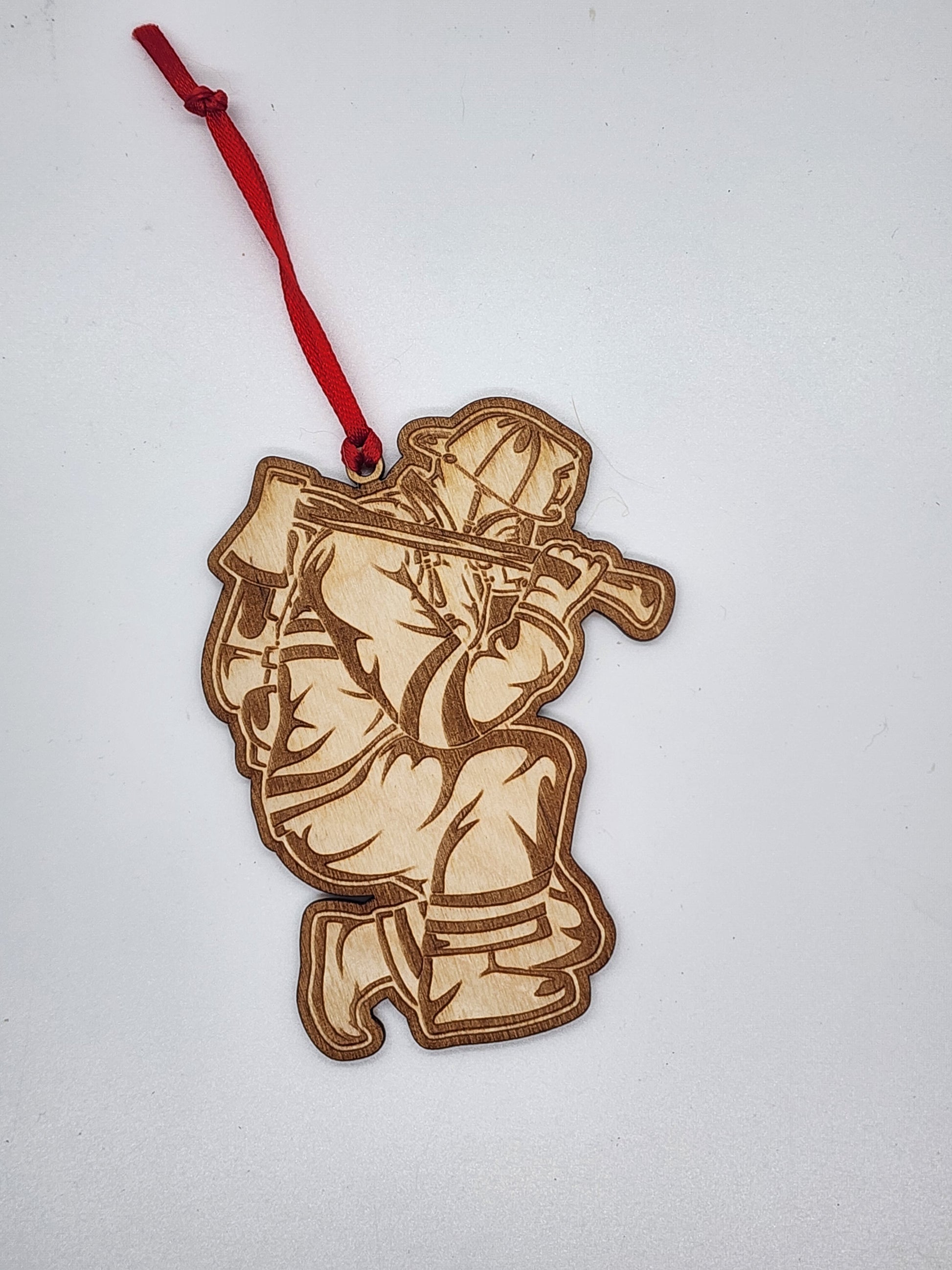 Kneeling Fireman Christmas Ornament